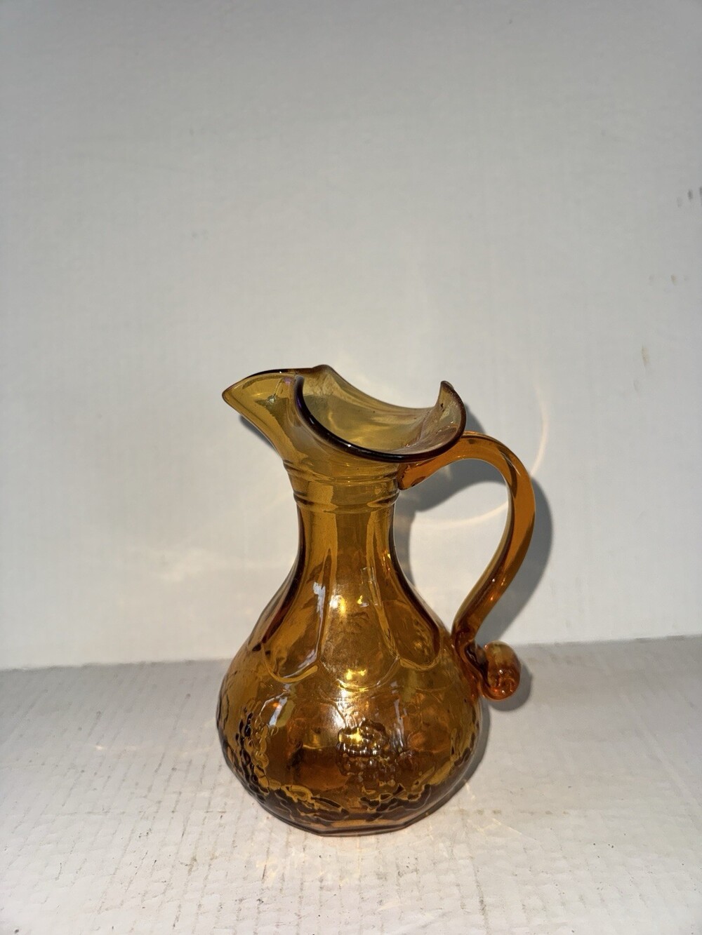 Vintage Amber Glass Mini Pitcher Grape Vine Pattern Ruffled Rim 6.5” - Picture 2 of 4